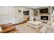 Comfortable living room with fireplace, built-in shelving, and neutral color palette that is welcoming and ideal for relaxation at 4505 Glengary Ne Dr, Atlanta, GA 30342