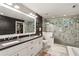 Sleek main bathroom with double sinks, a marble shower, and a modern aesthetic at 4505 Glengary Ne Dr, Atlanta, GA 30342