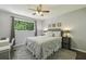 This bedroom boasts an oversized window, and neutral colors at 5400 Roswell Rd # H5, Atlanta, GA 30342