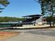 Baseball field with covered bleachers, and clear blue skies, offering a great view for spectators at 8531 Spivey Village Trl, Jonesboro, GA 30236