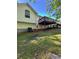 Back of house featuring a backyard and deck at 2180 Ridge Rd, Canton, GA 30114