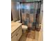Functional bathroom with a vanity, toilet, and shower with a privacy curtain at 2180 Ridge Rd, Canton, GA 30114