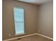 Neutral bedroom with carpet and a window offering natural light and ventilation at 2180 Ridge Rd, Canton, GA 30114