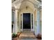 Front door with decorative plants and stone walkway at 2180 Ridge Rd, Canton, GA 30114