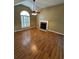 Living room with wood floors, fireplace, and natural light at 2180 Ridge Rd, Canton, GA 30114