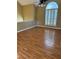 Bright living room with hardwood floors and large window allowing for natural light at 2180 Ridge Rd, Canton, GA 30114