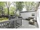 Cozy back deck with comfortable seating and a view of the landscaped backyard at 308 Greenwood Ave, Decatur, GA 30030