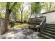 Backyard retreat with stone patio, comfortable seating, and a peaceful ambiance at 308 Greenwood Ave, Decatur, GA 30030