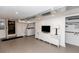 Finished basement with tiled flooring, laundry area, and open layout at 308 Greenwood Ave, Decatur, GA 30030