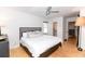 Bright bedroom with hardwood floors, a ceiling fan, and a cozy queen size bed at 308 Greenwood Ave, Decatur, GA 30030