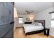 Relaxing bedroom with hardwood floors, a ceiling fan, and a comfortable queen size bed at 308 Greenwood Ave, Decatur, GA 30030