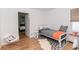 Modern bedroom showcasing hardwood floors and connecting room at 308 Greenwood Ave, Decatur, GA 30030