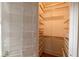 Well-organized walk-in closet with white wire basket organizers and wood shelving at 308 Greenwood Ave, Decatur, GA 30030