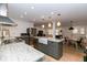 Open kitchen with large island, stainless steel appliances, and access to the dining and living areas at 308 Greenwood Ave, Decatur, GA 30030