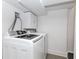 Laundry area with front load washer and dryer at 308 Greenwood Ave, Decatur, GA 30030