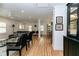 Bright open-concept living area with hardwood floors and modern furnishings at 308 Greenwood Ave, Decatur, GA 30030