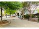 Inviting public space featuring benches, picnic tables, and lush landscaping, providing a serene community area at 308 Greenwood Ave, Decatur, GA 30030