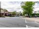 Street view of Mojo Pizza, showcasing outdoor dining and community event signage, creating a lively atmosphere at 308 Greenwood Ave, Decatur, GA 30030