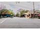 Charming streetscape featuring Mojo Pizza and mature trees, offering a vibrant community atmosphere at 308 Greenwood Ave, Decatur, GA 30030