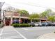 Neighborhood storefronts with Mojo Pizza Bar and local businesses, adding to the vibrant community atmosphere at 308 Greenwood Ave, Decatur, GA 30030
