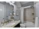 Inviting bathroom with shower-tub combo and granite vanity, designed for comfort and style at 3330 Camellia Ln, Suwanee, GA 30024