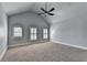 Spacious bedroom with vaulted ceilings and ample natural light, creating a peaceful and inviting atmosphere at 3330 Camellia Ln, Suwanee, GA 30024