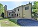 Beautiful exterior of a home, featuring a spacious backyard and manicured lawn at 3330 Camellia Ln, Suwanee, GA 30024