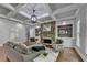 Inviting living room with a stone fireplace, built-in shelving, and ample seating at 3330 Camellia Ln, Suwanee, GA 30024