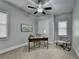 Well-lit office space with a ceiling fan, offering a practical and comfortable workspace at 3330 Camellia Ln, Suwanee, GA 30024