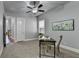 Comfortable office featuring a ceiling fan and ample natural light, creating a productive atmosphere at 3330 Camellia Ln, Suwanee, GA 30024