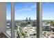 Breathtaking city views framed by modern windows in a luxurious urban setting at 3630 Peachtree Ne Rd # 3207, Atlanta, GA 30326