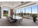 Spacious conference room with abundant natural light, stylish lighting, and a large table at 3630 Peachtree Ne Rd # 3207, Atlanta, GA 30326