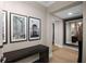 Stylish entryway with dark wood accents, contemporary art, and hardwood floors at 3630 Peachtree Ne Rd # 3207, Atlanta, GA 30326