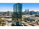 Stunning glass high-rise building with panoramic city views and modern architecture on a sunny day at 3630 Peachtree Ne Rd # 3207, Atlanta, GA 30326