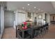 Modern kitchen with stainless steel appliances and large granite island at 3630 Peachtree Ne Rd # 3207, Atlanta, GA 30326