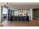 Bright kitchen with a large island, bar seating, and floor-to-ceiling windows at 3630 Peachtree Ne Rd # 3207, Atlanta, GA 30326