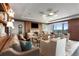 Bright living room offering comfortable seating, large windows, and views of the skyline at 3630 Peachtree Ne Rd # 3207, Atlanta, GA 30326