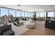 Bright living room featuring floor-to-ceiling windows and open floor plan at 3630 Peachtree Ne Rd # 3207, Atlanta, GA 30326
