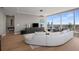 A stylish living room with floor-to-ceiling windows offers stunning city views at 3630 Peachtree Ne Rd # 3207, Atlanta, GA 30326