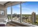 Stunning city view from a bright living space with floor-to-ceiling windows and comfortable seating at 3630 Peachtree Ne Rd # 3207, Atlanta, GA 30326