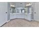 Bathroom featuring large mirror, double vanity, and tile floors at 716 Crimson Morning Vw, Canton, GA 30114