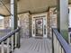 Inviting front porch with stone accents and a decorative wooden door at 716 Crimson Morning Vw, Canton, GA 30114