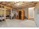 Unfinished basement with exposed wood beams, and framing, including a sauna at 815 Regal Sw Ln, Atlanta, GA 30331