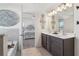 Elegant bathroom with dual vanity and soaking tub at 815 Regal Sw Ln, Atlanta, GA 30331