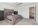 Bedroom featuring a comfortable bed, neutral tones, and modern ceiling fan at 815 Regal Sw Ln, Atlanta, GA 30331