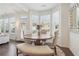 Cozy dining area with round table, stylish chairs, and natural light at 815 Regal Sw Ln, Atlanta, GA 30331