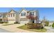 Charming home featuring a two-car garage, manicured lawn, and welcoming curb appeal at 815 Regal Sw Ln, Atlanta, GA 30331