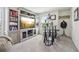 Spacious living room with custom built-ins, TV, and comfortable seating at 815 Regal Sw Ln, Atlanta, GA 30331