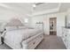Comfortable main bedroom featuring a tray ceiling and carpet at 815 Regal Sw Ln, Atlanta, GA 30331