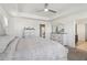 Spacious main bedroom with tray ceiling and soft carpet at 815 Regal Sw Ln, Atlanta, GA 30331